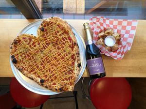 House made vegan cashew mozzarella plain heart shaped pizza (heart shaped pizzas available valentines day only!) at Scottie's Pizza Parlor in Portland