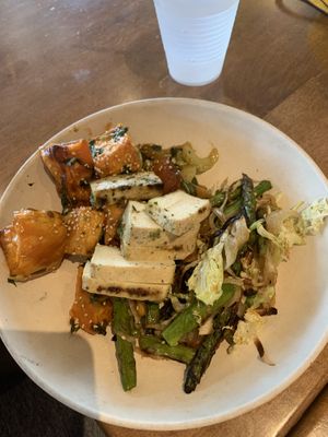 Tofu entree with asparagus and sweet potato  at Flower Child in Addison