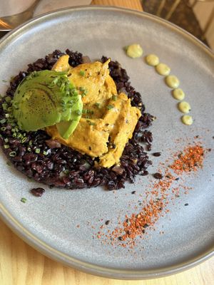 Curry heura with black rice   at Avocado Love in Madrid