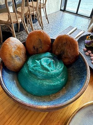 Avocado hummus with spirulina, aubergine tempura at Avocado Love in Madrid