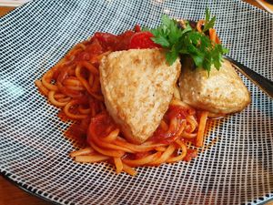 Tagliatelle with paprika tomato sauce with vegan chicken at Wilma Wunder in Dusseldorf