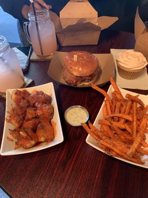 Buffalo bites, sweet potato fries, spicy chick’n sandwich, strawberry cupcake, watermelon peach lemonades at Wisdom's Vegan Bakery & Cafe in Spring