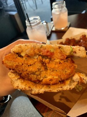 Half of spicy chick’n sandwich  at Wisdom's Vegan Bakery & Cafe in Spring