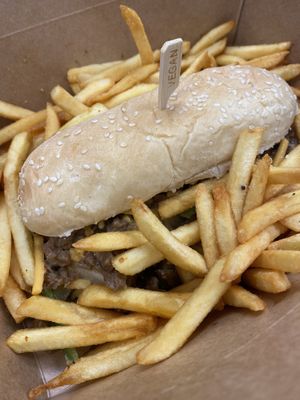 Philly and truffle fries (requested to put both in same box) at Wisdom's Vegan Bakery & Cafe in Spring