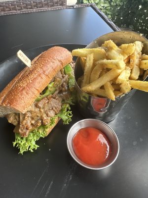 Philly and garlic/ Parmesan fries   at Wisdom's Vegan Bakery & Cafe in Spring