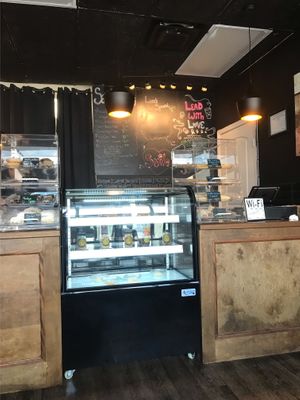 Menu in the back at Wisdom's Vegan Bakery & Cafe in Spring