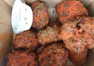 Buffalo Cauliflower Bites at Wisdom's Vegan Bakery & Cafe in Spring