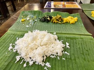 Banana leaf meal (containers of extra curry and poppadoms also)   at Sri Kaveri in Malacca