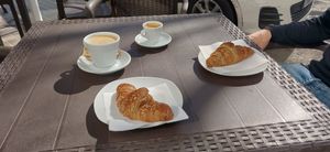 Croissants veganos de quinoa i mermelada de arándanos, café solo y con bebida de soja at Estel De Mar in Barcelona