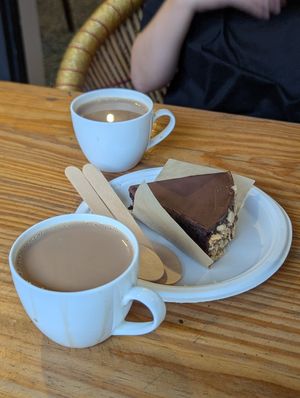 Vegan hazelnut cake and vegan chai at Step Out Cafe in Jaipur
