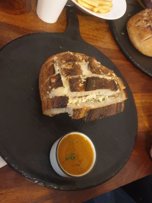 Garlic share loaf with Mariana 7/10 nice but expected to be warm and more garlic at Step Out Cafe in Jaipur