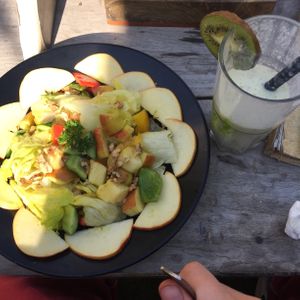 Delicious! Apple walnut salad and kiwi shake  at Step Out Cafe in Jaipur