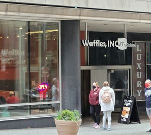 Amazing waffle options!  Vegan, gluten-free, fluffy waffles with a wide ranging assortment of toppings, such as blueberries and cranberries, along with real maple syrup.   at Waffles INCaffeinated - Fifth Ave in Pittsburgh