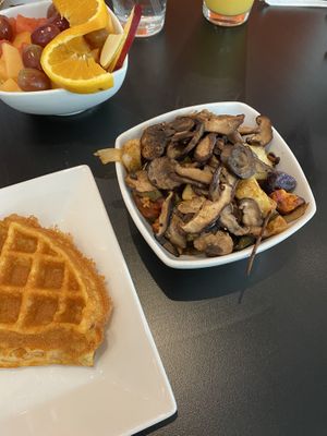 Home fries (tri-colored potatoes) with onions, peppers, and added mushrooms 😊 at Waffles INCaffeinated - Fifth Ave in Pittsburgh