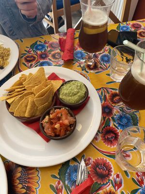 Nachos, salsa, guacamole and Long Island iced teas at Dos Sombreros in Brighton
