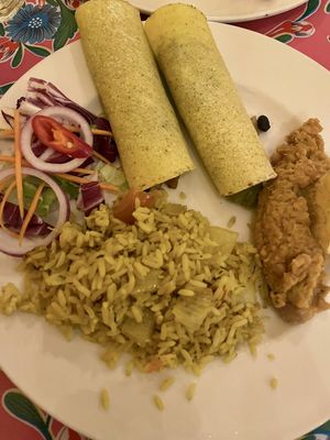 Enchiladas (two corn tortillas filled with black beans and mixed veg, served with rice and refried beans).  at Dos Sombreros in Brighton