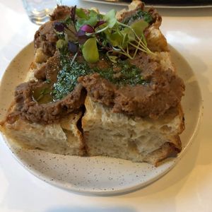 Focaccia with smoked eggplant spread and pesto at Bistro Tendresse in Montreal