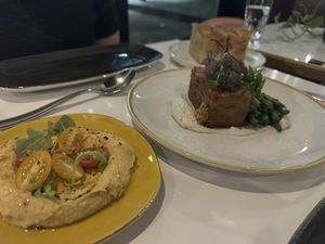 From left to right: smoked paprika hummus, pavé entree, and focaccia  at Bistro Tendresse in Montreal