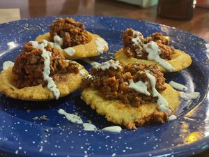 Una especie de arepa o talo bien rico con picadillo  at Mostaza y Media in Gijon