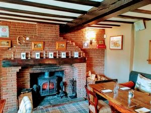 Fireside dining area at The Fairfax Arms in York