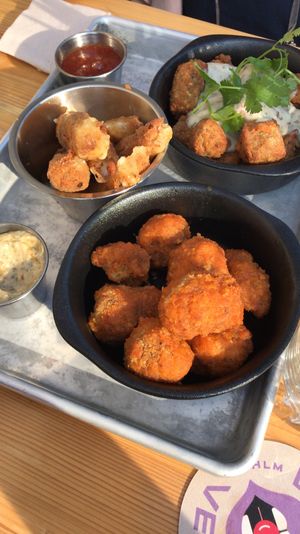 Popcorn Chick'n (with green sprig), Cheez Sticks (left) and Buffalo Wings at Dirty Vegan in Stockholm