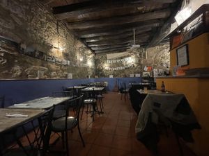 Inside (note the beautiful ceilings and the artwork around the sides) ￼  at Casa da Horta in Porto