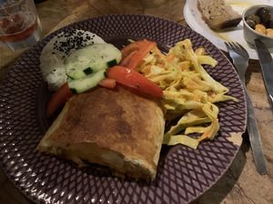 Great olives! Savoury pastry with tofu and veggies. Fresh and delicious coleslaw    at Casa da Horta in Porto