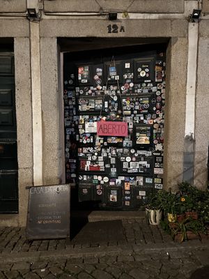 Big front door, small insidee  at Casa da Horta in Porto