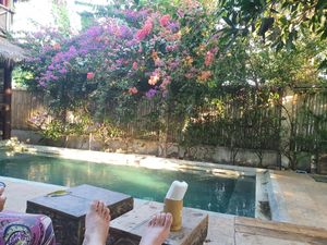 The pool area in front at Flowers & Fire in 