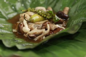 three-flavored mushroom steamed in lotus (banana) leaf at Phuc An in Da Nang