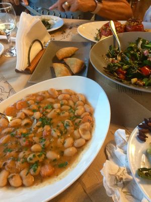 Giant beans, spinach salad without honey, tomato stuffed with rice and pies with wild greens at Taverna Babis in Crete