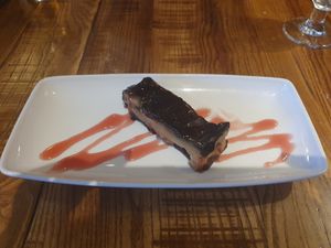 Salted caramel billionaires gold bar with strawberry sauce at The Anderton Arms in Preston