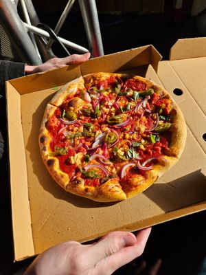 Mariana pizza with onion and jalapeños at Whitby Brewery in Whitby