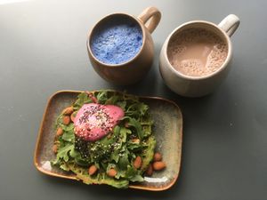Green waffle. Raw chocolate and blue spirulina and blueberry latte.  at Matcha Bar in Copenhagen