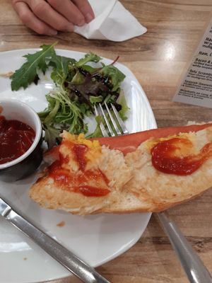 Bacon and egg roll (with my added tomato sauce) at Fibonacci Coffee in Baulkham Hills