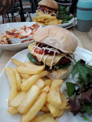 Real burger, chipotle chicken burger and half eaten gnocchi at Fibonacci Coffee in Baulkham Hills