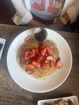 Banana Quinoa pancakes — added at strawberries on top   at Tryst Cafe in Chandler