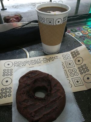 Vegan dark chocolate donut and coffee at Doughnut Plant - Hotel Chelsea in New York City