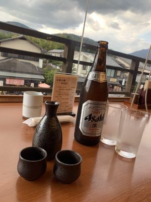 Asahi beer and Hot sake with the nice street view! at Saga Tofu Ine (Main Branch) 嵯峨とうふ 稲 本店 in Kyoto