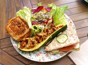 Savory plate from the brunch: Stuffed zucchini, croque monsieur, sandwich, salad at Molybagert Végétale Normandie  in Trouville-sur-mer