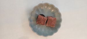 Complimentary raisin(?) syrup chocolate truffels at FREA in Berlin