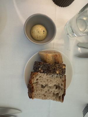 Sourdough and rye bread and miso butter  at FREA in Berlin