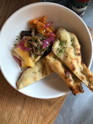 Lovely crispy/soft homemade sourdough flatbread with different pastes. Delicious. at FREA in Berlin