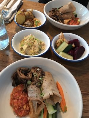 Buckwheat pancakes, roasted potatoes, coleslaw and fermented veggies. at FREA in Berlin