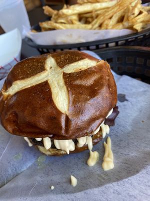 The Smash Burger and an order of plain fries    at Evolve Modern Vegan Kitchen in Daytona Beach