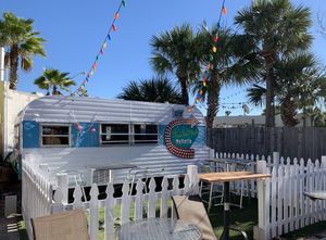 In back patio you can find 2 or more joints converge for a nice relaxing outdoor dining and entertainment venue. at Evolve Modern Vegan Kitchen in Daytona Beach