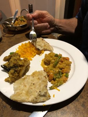 Saffron rice, naan bread and two curries.  at Goa Indian Fusion in Gold Coast