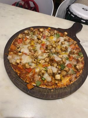Tofu pizza , slightly spicy bc of jalapeños   at Earth Cafe @ Waterfield in Mumbai
