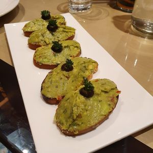 Guac on gluten-free toast ✅ at Earth Cafe @ Waterfield in Mumbai