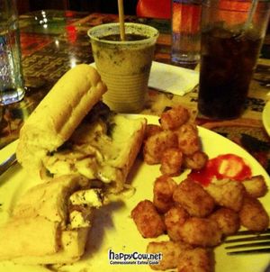 phillycheese sandwich with tofu, baked tater tots and a frozen Irish coffee! at 13 in New Orleans